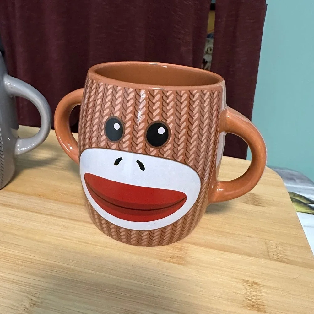 Sock Puppet Two‎ Handle Coffee Mug Brown Galerie